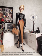 Load image into Gallery viewer, The car seat dress in faux leather with shoulder pads and coordinated belt
